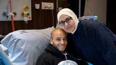 Yassin Sedhom and his mother, Lamiaa Abdelaal, at Burjeel Hospital in Sharjah, where he has received treatment for a rare and aggressive form of cancer. Ahmed Ramzan / The National
