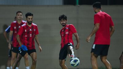 Midfielder Khalfan Mubarak (C), defender Bandar Al Ahbabi (9). Courtesy UAE FA