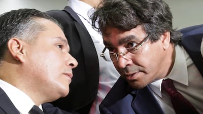 Mohamed Djemai, (R) was elected to lead Algeria's ruling National Liberation Front (FLN) party. Reuters