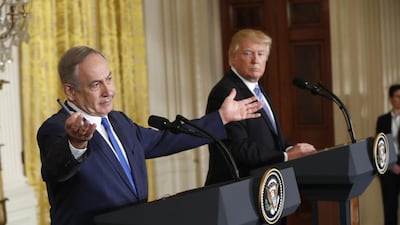 President Donald Trump and Israeli prime minister Benjamin Netanyahu give a joint news conference in the East Room of the White House in Washington. Pablo Martinez Monsivais / AP Photo