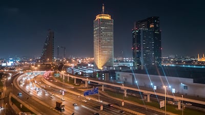 Dubai World Trade Centre is still a landmark in a line of skyscrapers on Sheikh Zayed Road. Alamy