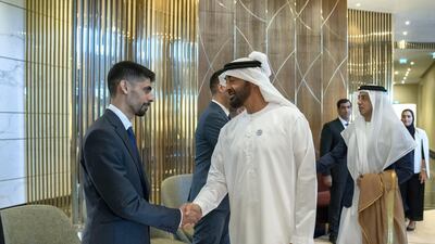 Sheikh Mohamed encouraged the country's citizens abroad to excel in scientific excellence in all fields. Seen here with Sheikh Mansour.