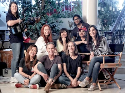 Horror film ‘The Shadow’ has a strong contingent of women on its cast and crew including its director Al Khaja and producer Rita Dagher, seated second left. Courtesy Nayla Al Khaja Films