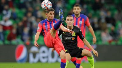 Chelsea's Jorginho in action with Krasnodar's Daniil Utkin. Reuters