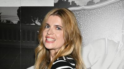 French actress Cecile Cassel is classically chic in monochrome stripes at Paris Fashion Week. Getty Images