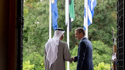 President Sheikh Mohamed is received by Mr Mitsotakis.