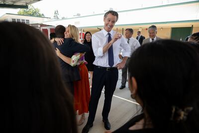 California Governor Gavin Newsom talks to students at River City High School in West Sacramento, California, last month. EPA