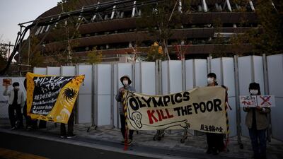 Protesters demanding cancellation of Tokyo 2020 Olympic Games hold a rally in front of the National Stadium in Tokyo. Reuters