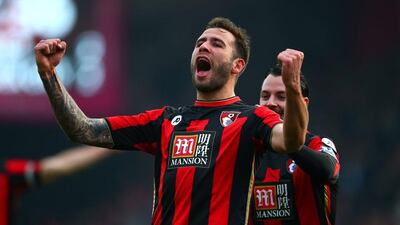 Steve Cook (L) of Bournemouth celebrates scoring his team’s third goal with his teammate Adam Smith (R) during the Premier League match between AFC Bournemouth and Swansea City at Vitality Stadium on March 12, 2016 in Bournemouth, England. (Photo by Jordan Mansfield/Getty Images)
