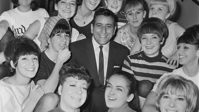 Tony Bennett and a group of chorus girls during a rehearsal for the Royal Variety Show in London, the UK, in November 1965. Getty Images
