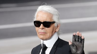 Karl Lagerfeld was rarely seen without gloves on (AP Photo/Christophe Ena, File)