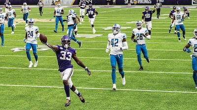 Minnesota Vikings running back Dalvin Cook scores a touchdown during the NFL game against the Detroit Lions, on Sunday, November 8. AP