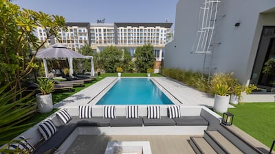 The sunken seating area and swimming pool