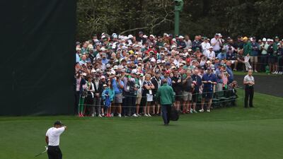 A bumper crowd watch Tiger Woods on the 15th hole at the Augusta National Golf Club. EPA