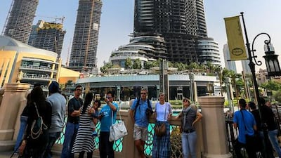 The Address Downtown Dubai Day 2. Damage of the fire. Shot from Souk Al Bahar area bridge connecting to Dubai Mall.