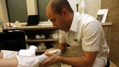 Maxime, Manager, Bastein Gonzalez Spa, displays the Paraffin wax foot mask. Satish Kumar / The National