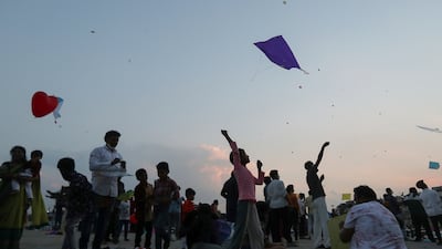 People fly kites during Makar Sankranti festival in Hyderabad, India. AP