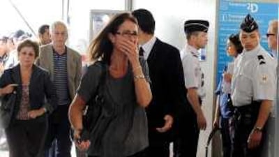 Relatives and friends of passengers of Air France's airliner arrive at the crisis centre at Charles de Gaulle airport yesterday.