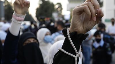 A small group of Jordanians protest against the French caricatures of Muslim's Prophet Muhammad in the area of the French embassy in Amman, Jordan. EPA