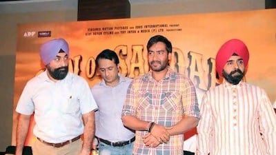 The Son of Sardaar actor Ajay Devgan, third from left, and the congress leader Charan Singh Sapra, right, were among people who recently met in Mumbai to address the Sikh community's concerns about the film. IANS