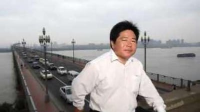 Chen Si, a local activist, who tries to prevent suicides on the Nanjing Yangtze River Bridge, made his first rescue in 2000.
