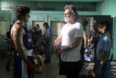 Farhan Akhtar and 'Toofaan' director Rakeysh Omprakash Mehra on set. Courtesy Amazon Prime Video