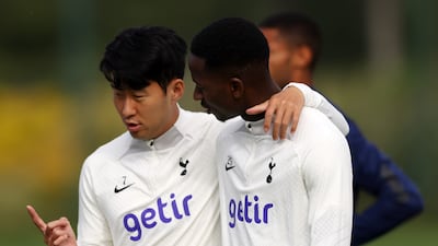 Son Heung-min talks to Pape Matar Sarr. Getty