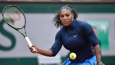 Serena Williams returns the ball to Ukraine's Elina Svitolina during their women's fourth round match at the French Open. Philippe Lopez / AFP