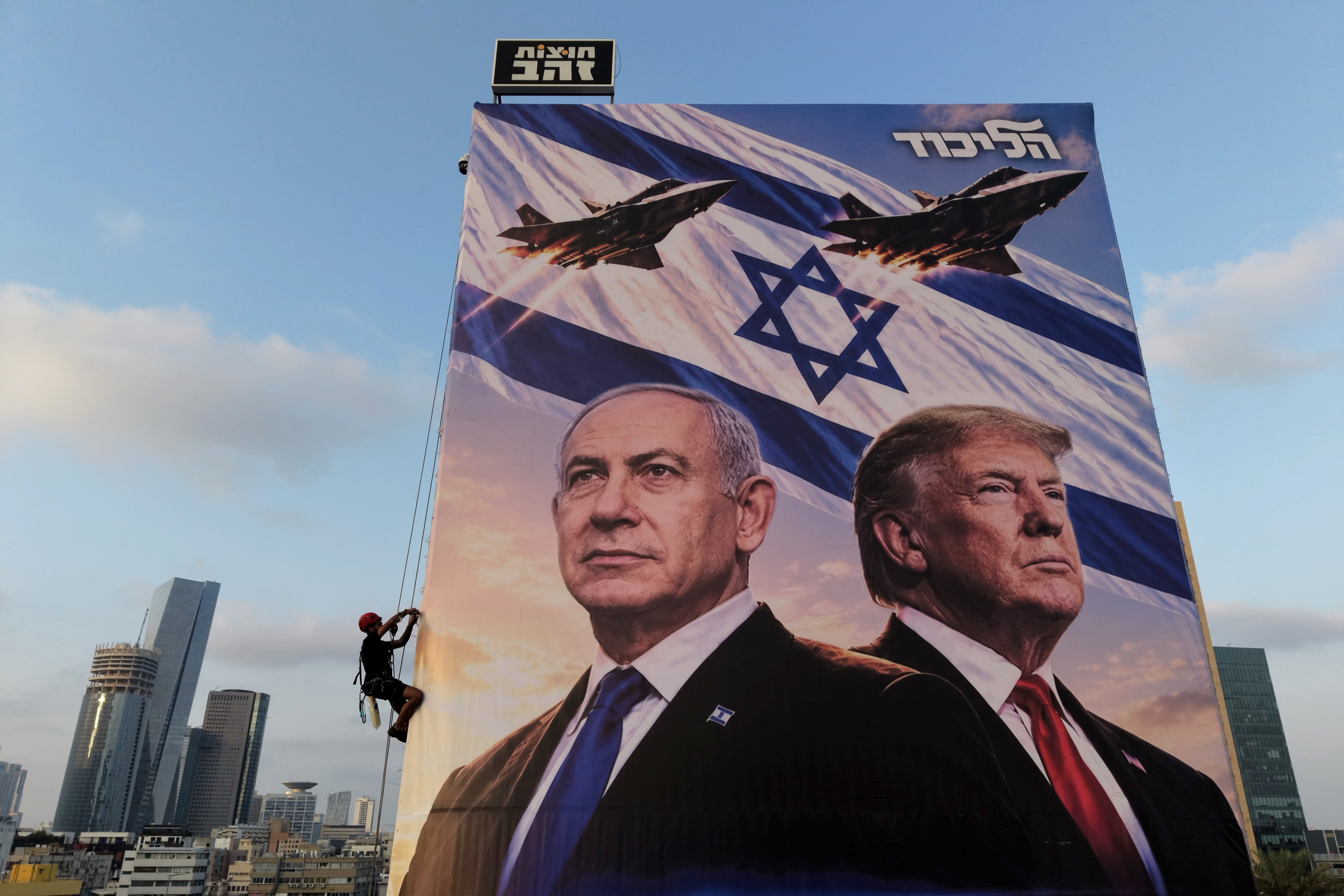 An Israeli election billboard featuring Prime Minister Benjamin Netanyahu and US President Donald Trump. EPA