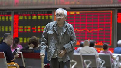 There has been a strengthening bearish sentiment in China after it clamped down on financial markets. Ng Han Guan / AP Photo