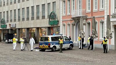 Police officers are pictured at the scene. AP Photo