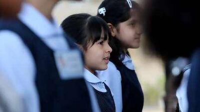 Maitha al Ayali, centre, during the assembly on the first day at Jumeirah Model School in Dubai.