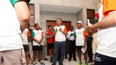 Sanjay Verma, the Indian consul general in Dubai, speaks to participants before the start of an 11km race held yesterday to mark India's Independence Day.