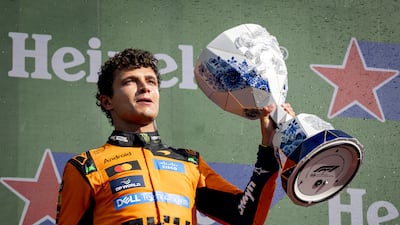Lando Norris celebrates after winning the Dutch Grand Prix. EPA