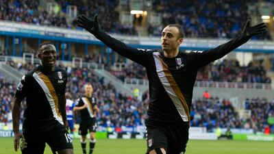 Fulham's Dimitar Berbatov celebrates his goal at Reading. Tom Hevezi/AP