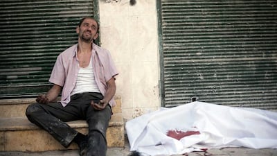 Thousand of families are being torn apart. Here a man cries near the body of his brother, again outside Dar El Shifa hospital.