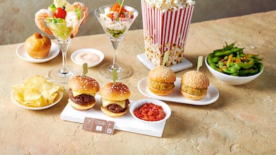 Passengers can order cinema snacks as they browse through the 5,000 channels on Emirates’ ice inflight entertainment system.