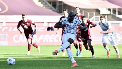 Inter Milan's Romelu Lukaku scores their first goal from the penalty spot. Reuters