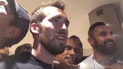 In this screenshot taken from YouTube, Christian Fuchs and his Leicester City teammates prepare to celebrate becoming Premier League champions.