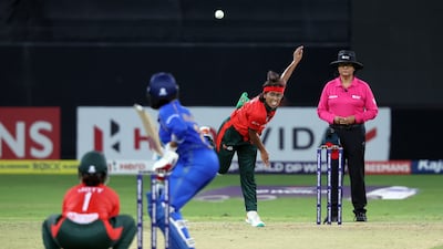 Bangladesh's Fahima Khatun bowls during the match against the UAE.
