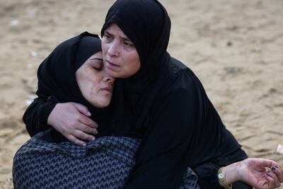 Palestinian women mourn victims of an Israeli strike outside Nasser Hospital in Khan Younis, in southern Gaza, on Thursday. AFP
