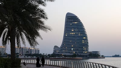 Total sales deals in Abu Dhabi's real estate sector hit Dh86.1 billion in the first half of 2026. Victor Besa / The National