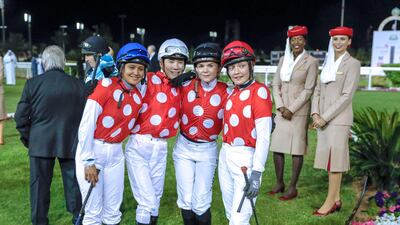 Lady jockeys before the Abu Dhabi meeting on Sunday. Victor Besa / The National