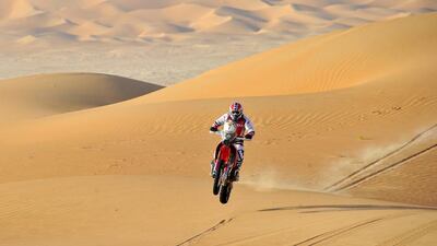 Paulo Goncalves driving his motorcycle during the Abu Dhabi Desert Challenge on April 10, 2014. Courtesy Abu Dhabi Desert Challenge
