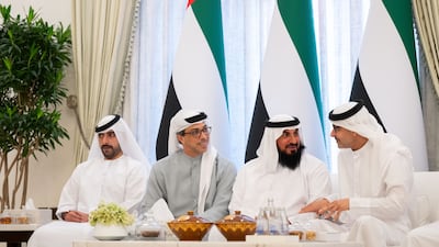 Members of the UAE leadership with Sheikh Zayed bin Tahnoon bin Mohammed, left. Mohammed Al Messabi / UAE Presidential Court