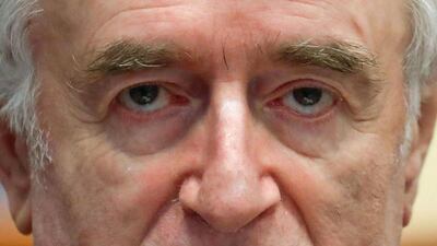 Former Bosnian Serb leader Radovan Karadzic appears in a courtroom before the International Residual Mechanism for Criminal Tribunals (MICT), in The Hague, on April 24, 2018. Yves Herman / AFP Photo