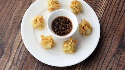 Chicken dumplings at Sticky Rice. Chris Whiteoak / The National