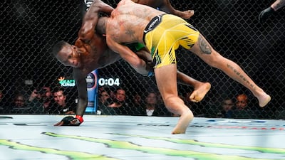 Alex Pereira takes down Israel Adesanya during the second round. AP