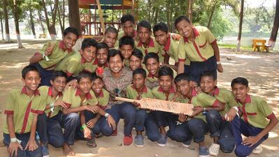 Former Bangladesh test cricket captain Mushfiqur Rahim visited the school that Eva Kernova set up in Bangladesh, along with Etihad volunteers. More than 600 cabin crew from Emirates and Etihad have visited since it opened. Courtesy Choice to Change