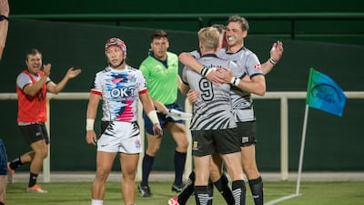 UAE players celebrate a try by scrum-half Andrew Semple (No 9) in their 36-32 win over South Korea in the Asian Rugby Championship at The Sevens Stadium, Dubai. All photos: Jon Ebbitt